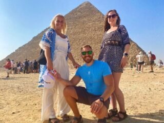 guests posing in front of pyramids 1