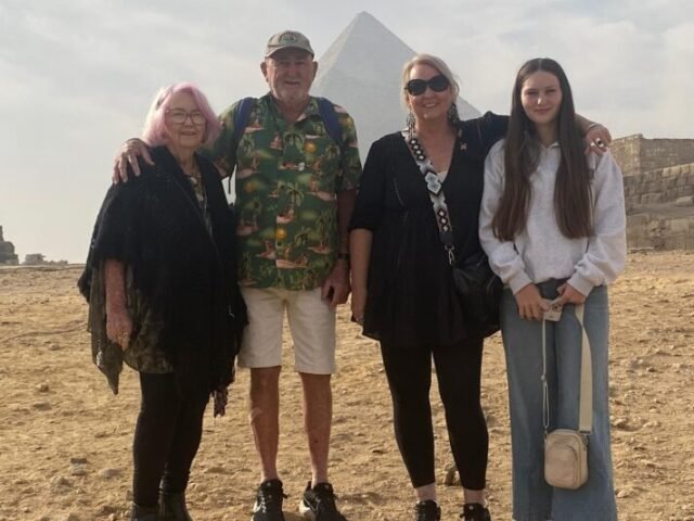 guests in front of pyramids