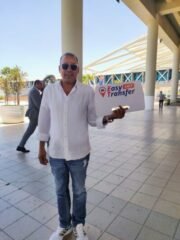 our driver holding our sign at the airport